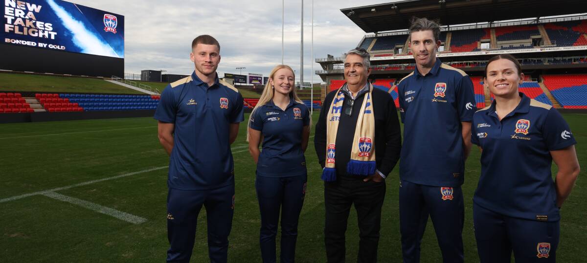 Jets Youth team captain Ben van Dorssen, left, at the announcement of new owners for the club. The defender has signed a two-year scholarship with the A-League squad. Picture by Simone De Peak 