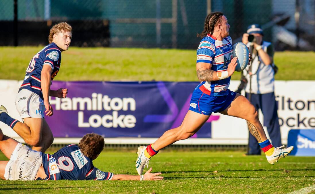 Alex Pohla is too quick for the Easts defence as the inside centre races away to score in the Hunter Wildfires' 31-10 win at No.2 Sportsground on Saturday. Picture by Stewart Hazell
