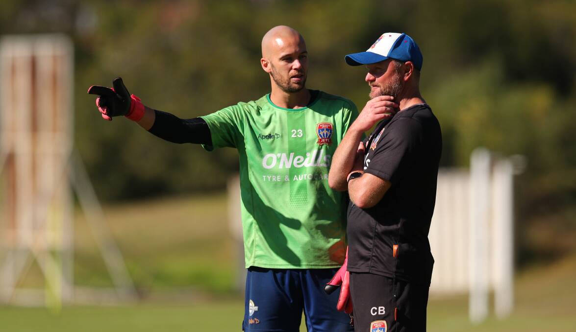 WORK IN PROGRESS: Jets gloveman jack Duncan and goalkeeping coach Chris Bowling at Newcastle training. Picture: Max Mason-Hubers