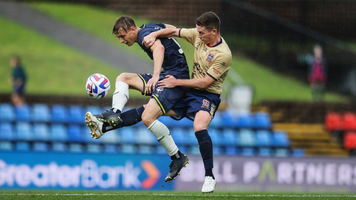 Jets captain Barndon O'Neill (right) returns from suspension against Melbourne Victory on Saturday. Picture by Marina Neil