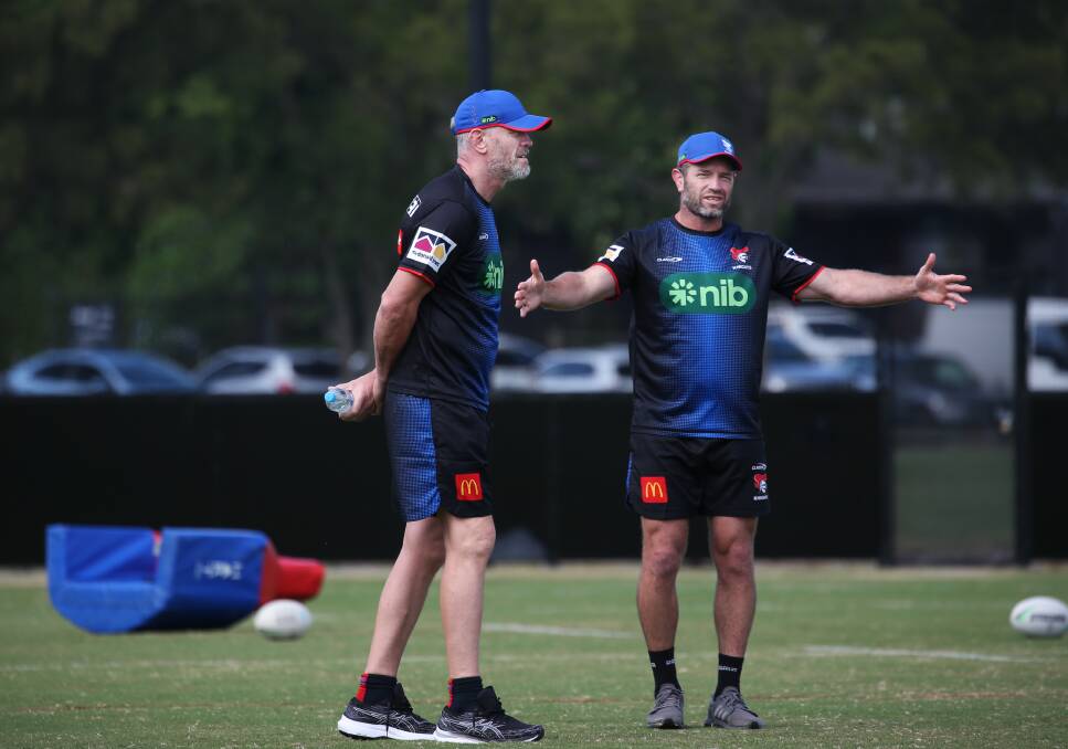 New Knights assistant coach Brian McDermott with club legend and general manager of football Danny Buderus at training on Tuesday. Picture by Simone De Peak