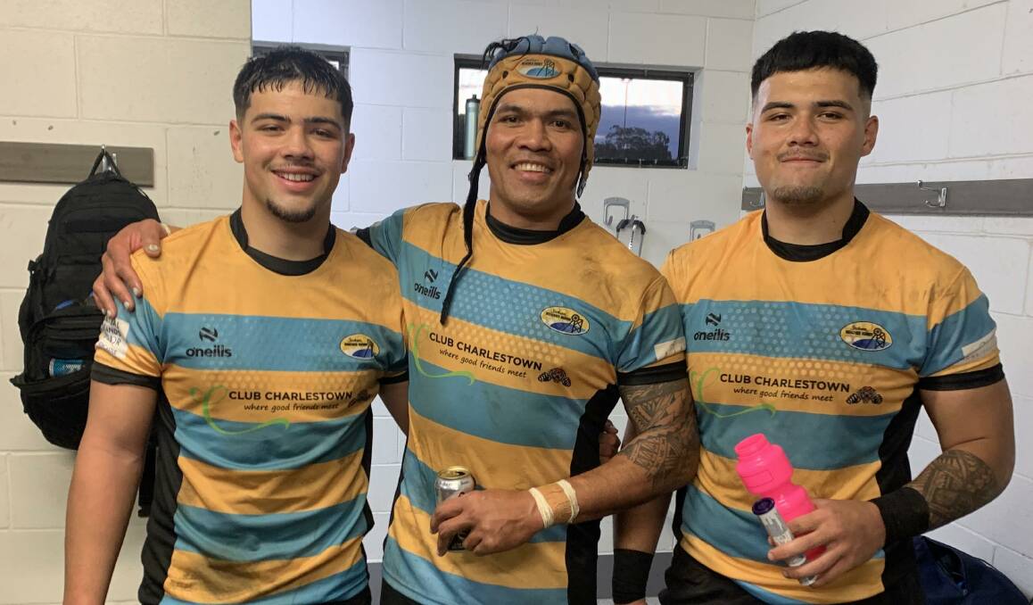 Player-coach Va Talaileva, centre, with sons TJ, left, and Phil after Southern Beaches' win over University. Picture Supplied