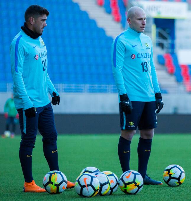 IN CAMP: Dimi Petratos and Aaron Mooy at the Socceroos' first training session ahead of the friendly against Norway in Oslo on Friday. Picture: FFA