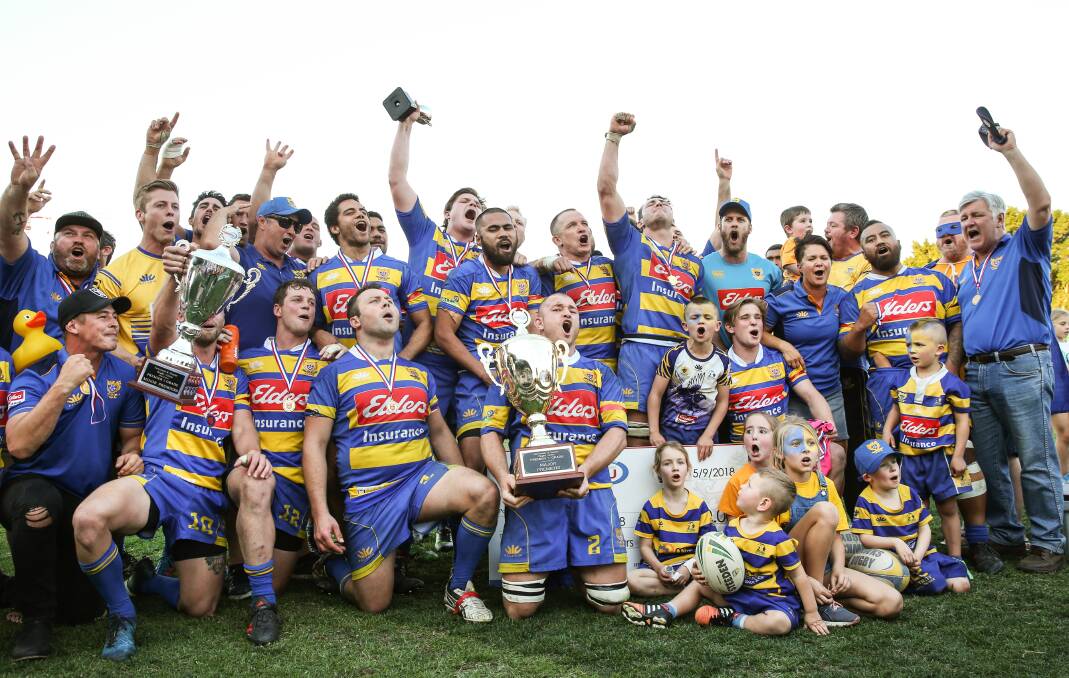 HISTORY-MAKERS: Hamilton celebrate after beat Maitland 20-12 in the grand final at No.2 Sportsground on Saturday to be the first team to win four straight premierships in 65 years. Picture: Marina Neil
