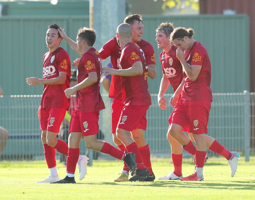 Broadmeadow celebrate a goal this season against Newcastle Olympic. Magic have jumped to fourth spot after 12 rounds of the NPL men's competition. Picture by Marina Neil