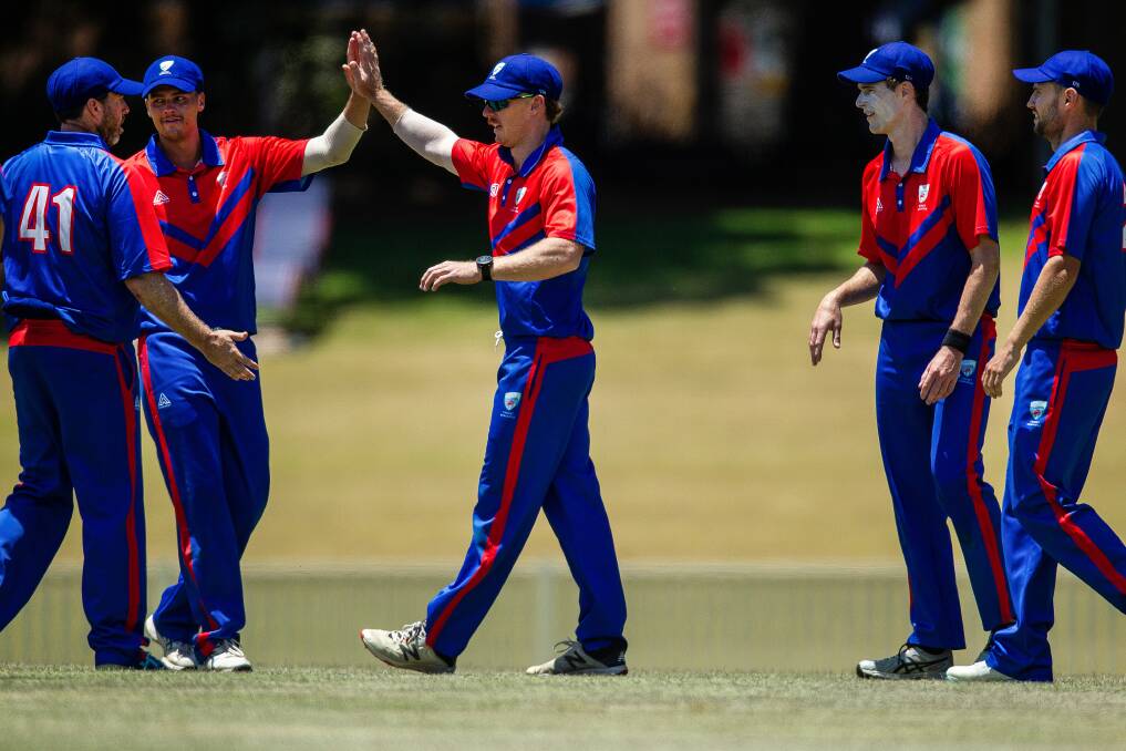 Newcastle celebrate a wicket in last season's NSW Country final win over Central Coast at No.1 Sportsground. Picture by Marina Neil