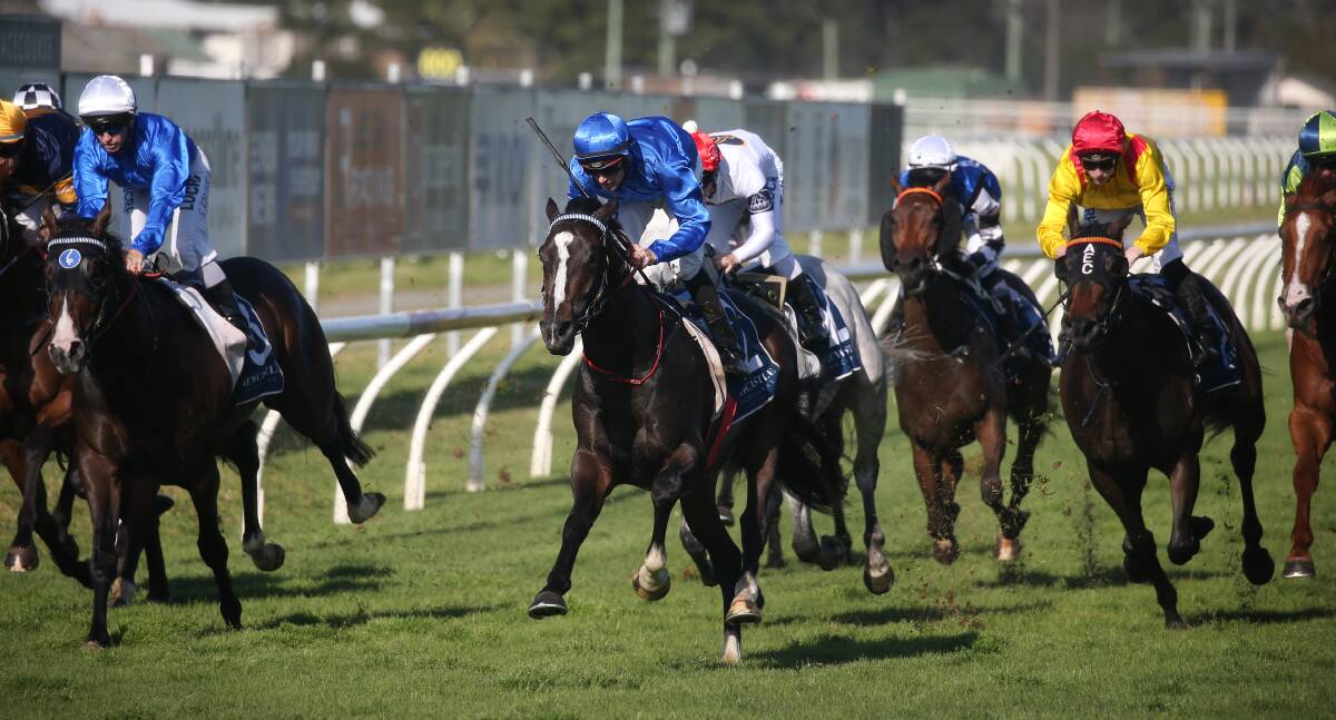 Aramayo, centre, carrying the Godolphin blue colours to victory at Newcastle in the 2018 Spring Stakes for three-year-olds. Picture by Marina Neil 
