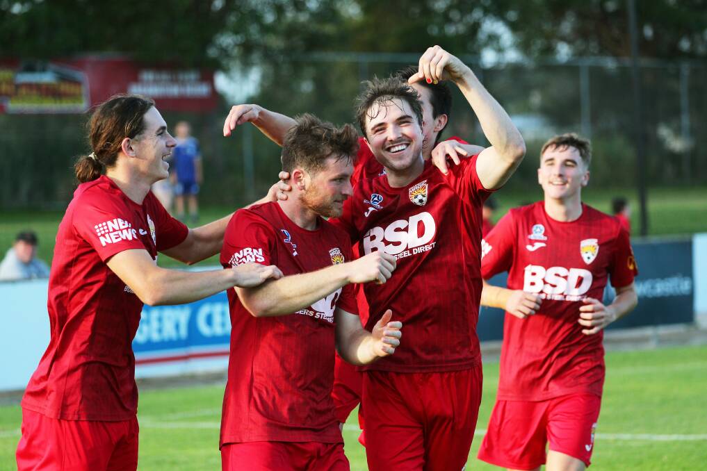 Broadmeadow celebrate Riley Smith's equaliser from the penalty spot on Sunday in their 3-1 win over Newcastle Olympic at Magic Park. Picture by Peter Lorimer