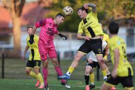 Maitland goalkeeper Matt Trott gets forward and goes for a header late in the 2-1 loss to Lambton Jaffas on Saturday. Picture Sproule Sports Focus