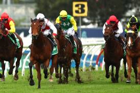Aaron Bullock, second from left, rides Know Thyself to victory at Rosehill on Saturday. Picture by Jeremy Ng, Getty Images
