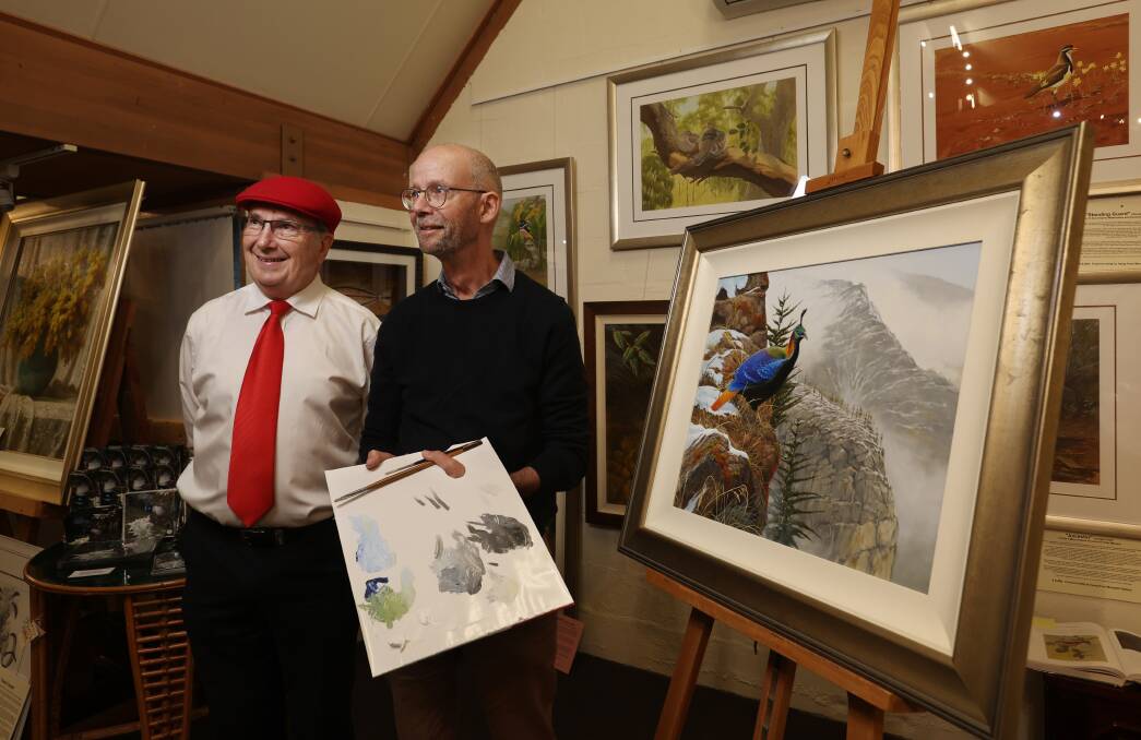 Trevor Richards, the organiser of the Feathers and Fur Wildlife Art Exhibition with artist and bird enthusiast Peter Marsack. Picture by Simone De Peak