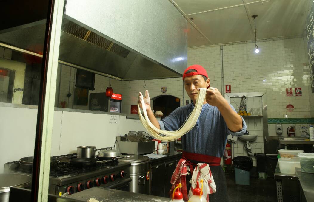Hua "Franky" Fan preparing his Lanzhou noodles. Picture by Max Mason-Hubers