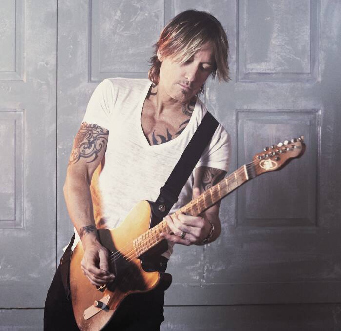 RETUNED: COVID has forced the postponement of Keith Urban's return to Newcastle.