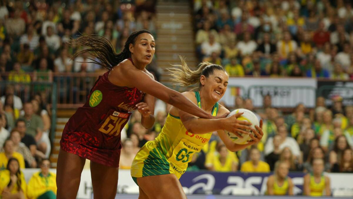 Geva Mentor and Sophie Garbin contest the ball in the one-goal thriller at Newcastle Entertainment Centre. Pictures by Marina Neil