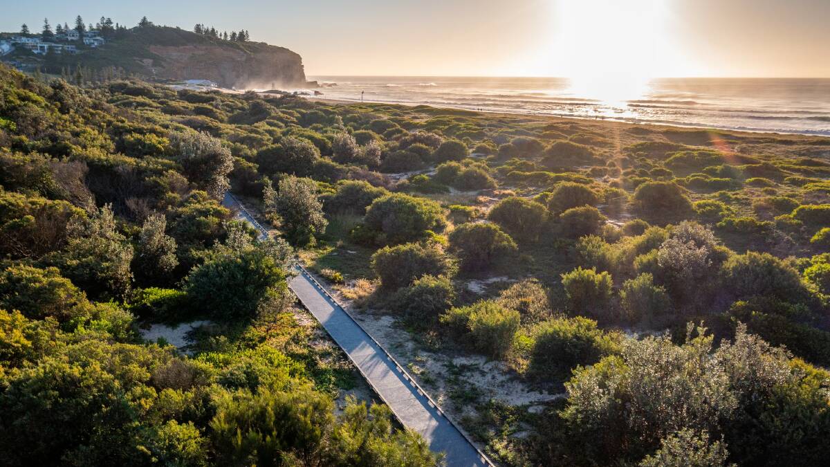 COASTAL VIEWS: The recently installed raised walkway stretches for 500 metres from Webb Park down to the popular Redhead Beach.