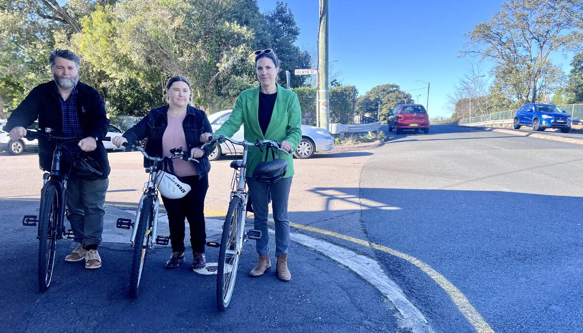 Outgoing Greens councillor John Mackenzie, candidate Sinead Francis Coan and candidate councillor Charlotte McCabe near the rail bridge on Maitland Road.