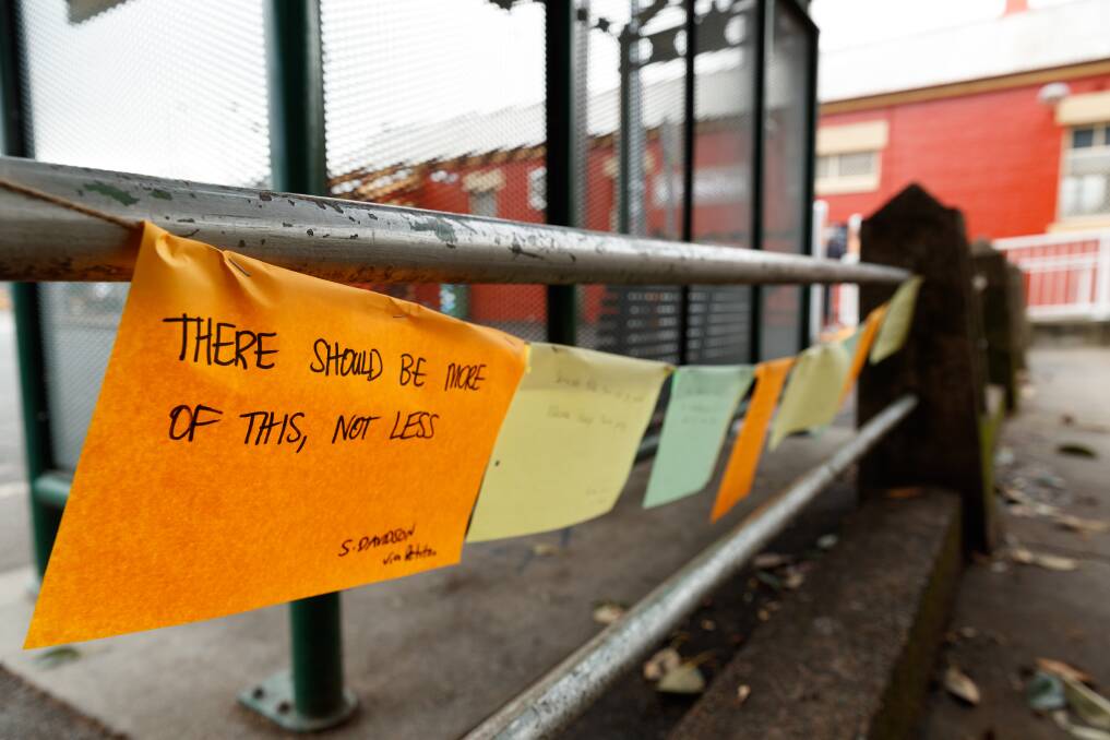SUPPORT: Messages from a petition to save the pantry were sprawled around the park on Wednesday.