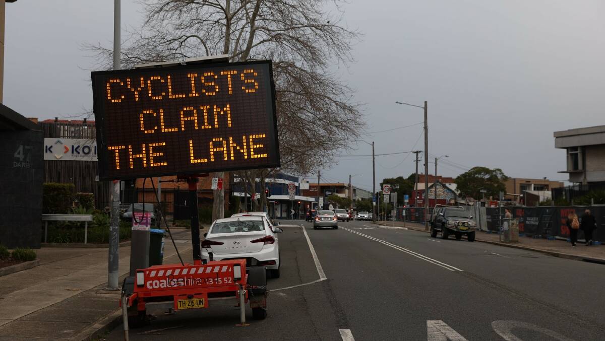 The 30km/h zone is designed for cyclists to "claim the lane" to avoid being hit by parked car doors. Picture by Marina Neil