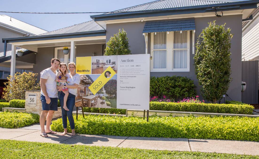MEREWETHER MOVE: Craig and Kirsty Smith, pictured with daughter Edie, sold their New Lambton home for $1.3015 million.