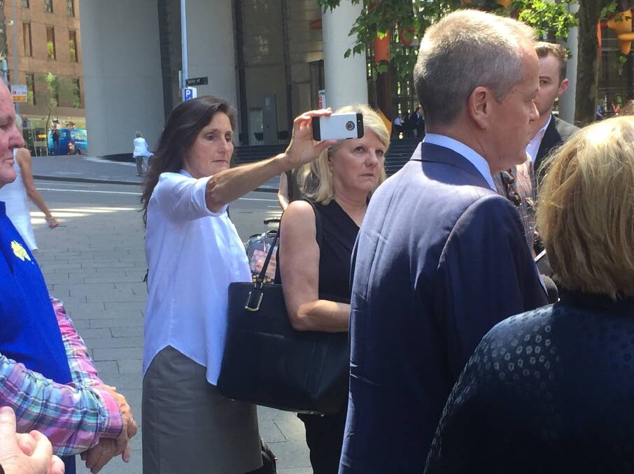 HARD AT WORK: Newcastle Herald journalist Joanne McCarthy at Opposition Leader Bill Shorten's media conference on the final day of the child abuse royal commission in Sydney.