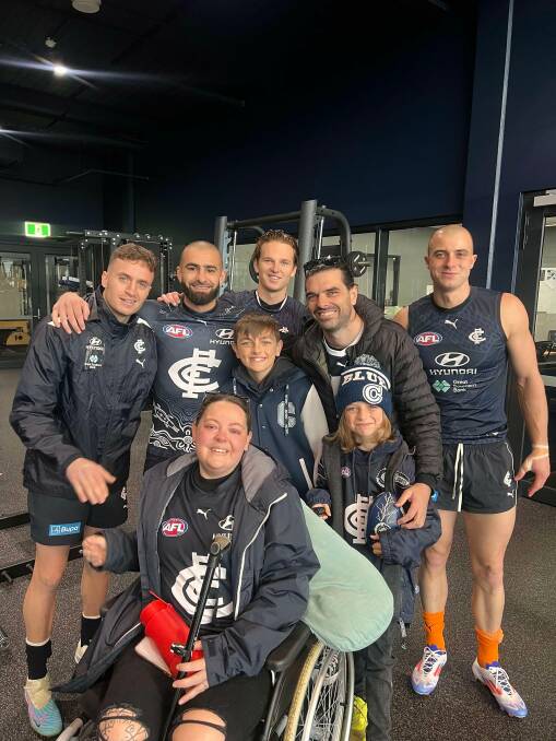 The Livermore family, from Jindera, pictured with Carlton players during an unforgettable day out together on July 4. Picture supplied