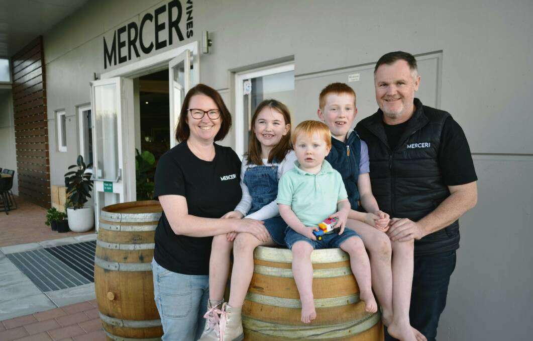 Aaron Mercer and wife Alison at their new cellar door with children Will, Audrey and little Charlie. 