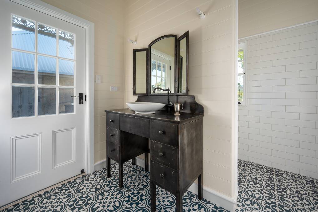 PATTERN PLAY: Tiles are the stars of the bathroom.