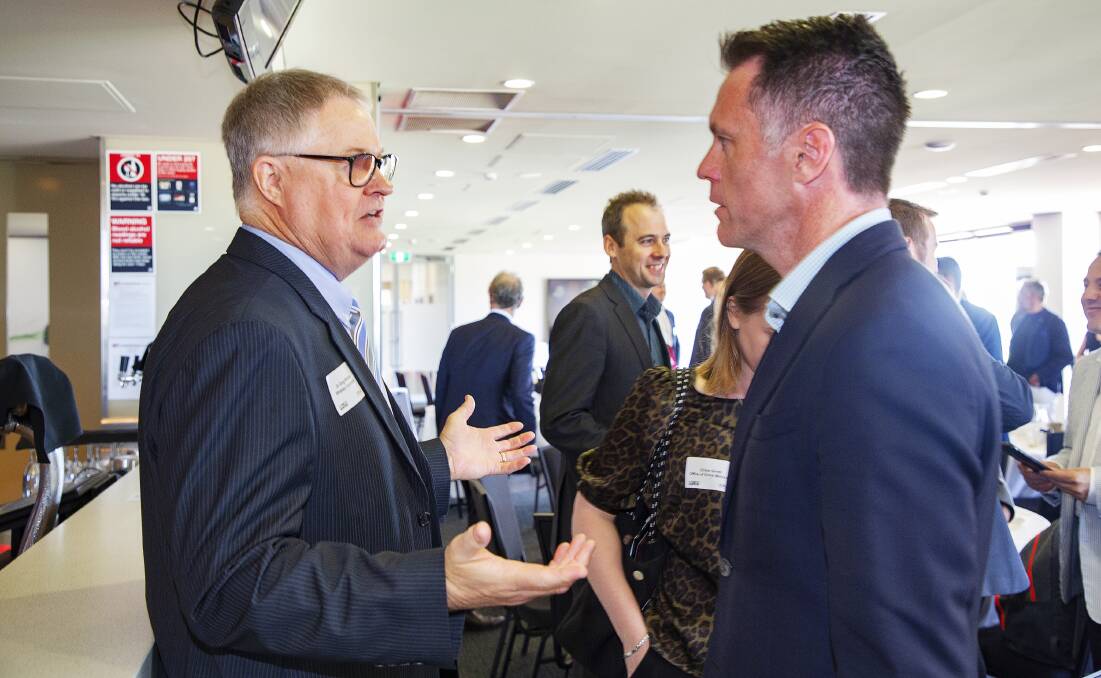 Greg Whiteley talks to opposition leader Chris Minns at a Business Hunter breakfast at McDonald Jones Stadium on Tuesday. Picture supplied