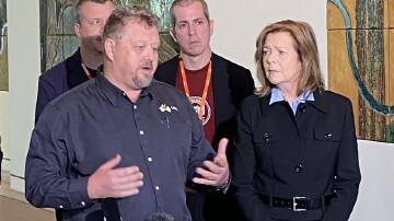 Glenn Kollner talking to reporters at Parliament House with ACTU president Michele O'Neil on Tuesday. Image supplied