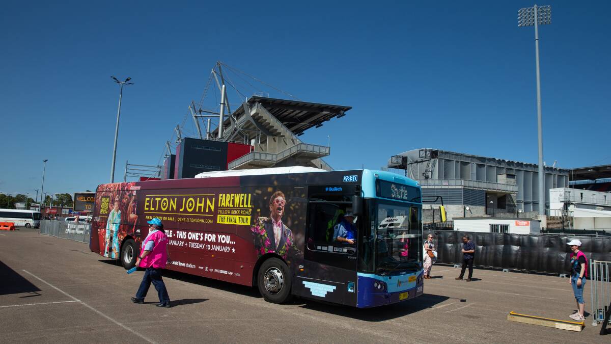 A Keolis Downer shuttle bus drops off passengers at Elton John's concert at Hunter Stadium on January 8. Picture by Marina Neil