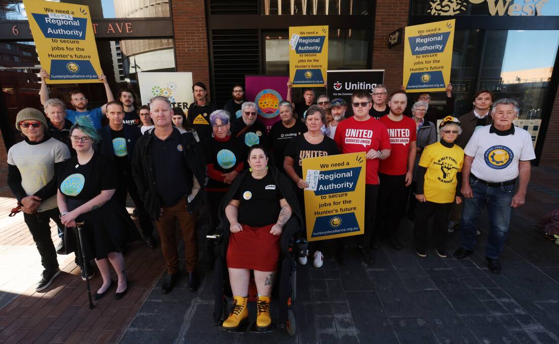 Members of Hunter Community Alliance and Hunter Jobs Alliance gather in Newcastle on Thursday to call for a better state plan for the region. Picture by Simone De Peak