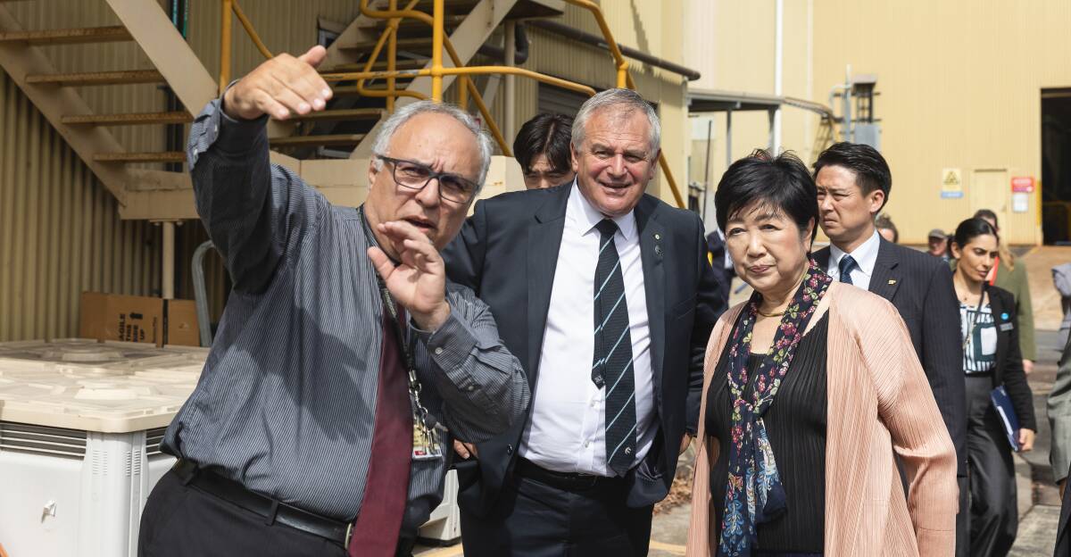 Laureate professor Behdad Moghtaderi and vice-chancellor Alex Zelinsky give Tokyo governor Yuriko Koike a tour of Newcastle Institute for Energy and Resources on Tuesday. Picture by Marina Neil