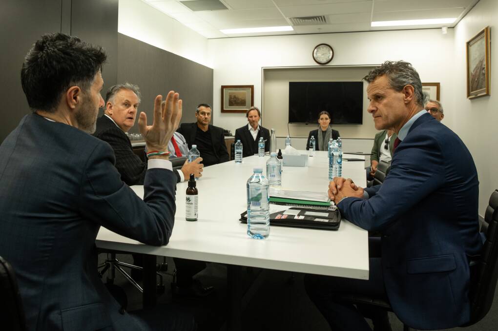 Victor Dominello, left, meets with Mark Latham, Tim Crakanthorp and hotel and bar industry representatives at Business Hunter's offices in Newcastle in 2020 to discuss a trial of relaxed trading restrictions. 
