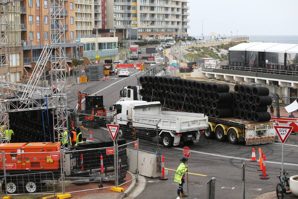 Contractors pack up part of the Supercars track infrastructure in Shortland Esplanade on Monday morning. Picture by Peter Lorimer