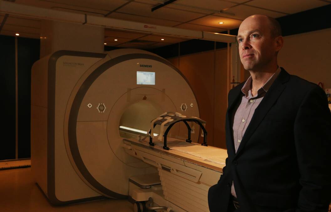 Milestone: Professor Peter Greer inside the MRI room at the Calvary Mater Hospital. He is leading a study into the use of MRI scans to work out treatment and doses for prostate cancer patients. Picture: Simone De Peak.