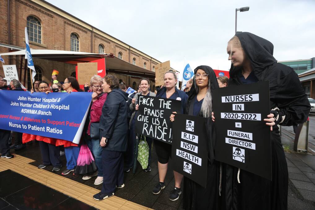 March: Hunter nurses and midwives during the last strike action in Newcastle. Picture: Simone De Peak
