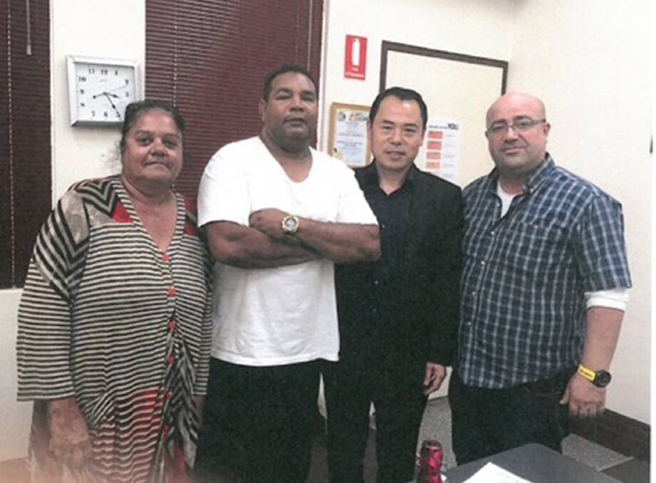 Happier times: Former chairwoman Debbie Dates, former deputy chairman Richard Green, Tony Zong and Sammy Sayed, an associate of Mr Zong, at the Awabakal Land Council office in Islington on October 23, 2015. Picture: ICAC
