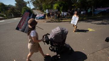 Community members protest at the lack of consultation in Nelson Bay last year. Picture by Peter Lorimer. 
