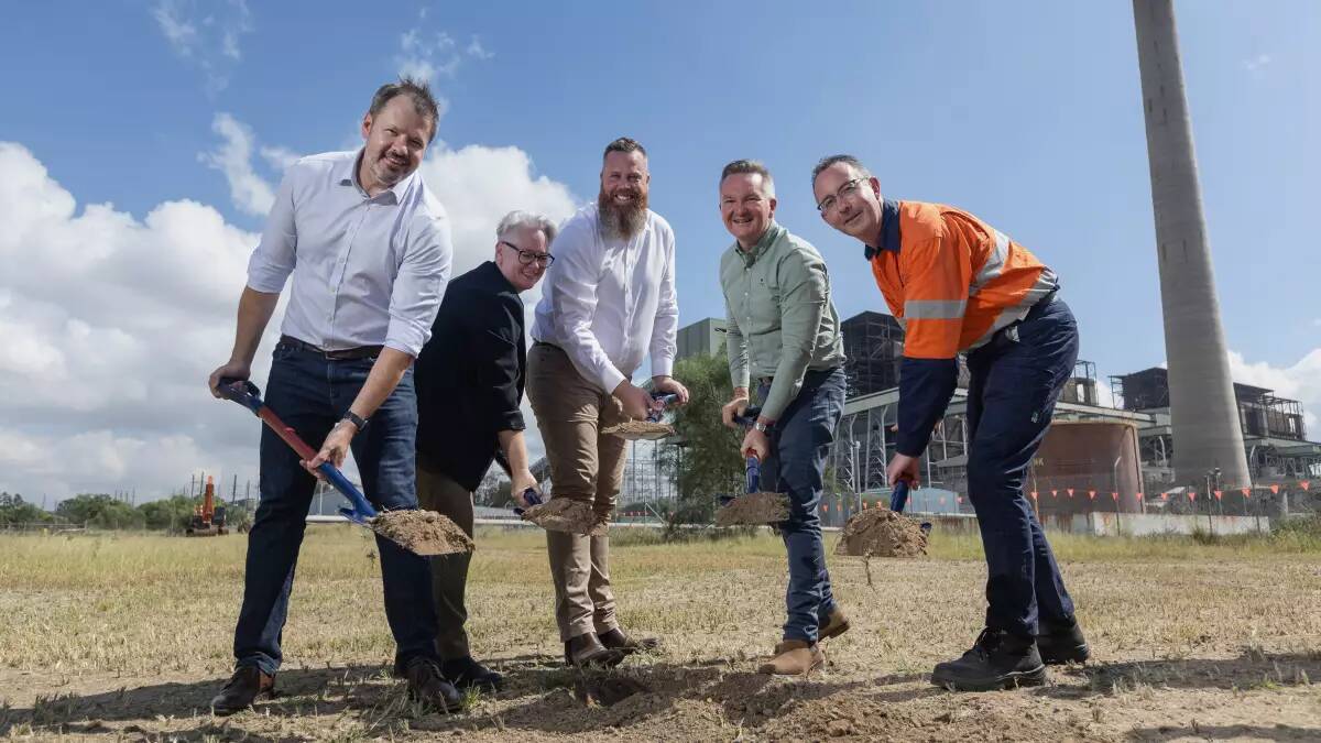 L-R Federal industry and science minister Ed Husic, NSW energy minister Penny Sharpe, Hunter MP Dan Repacholi, Federal industry minister Chris Bowen and AGL chief executive Damien Nicks at the site of the Liddell battery in March.Picture Marina Neil.