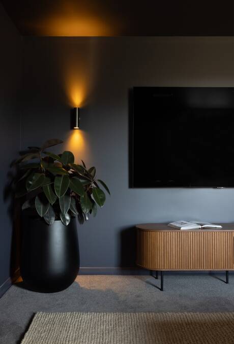 Dark walls are ideal for creating a sophisticated and warm ambiance, perfect for a media room. Pictures supplied 