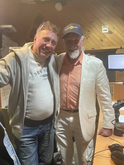 Super Radio Network general manager Guy Ashford with Carter Edwards during his final show at 2HD and Super Radio Network in 2022. Picture supplied