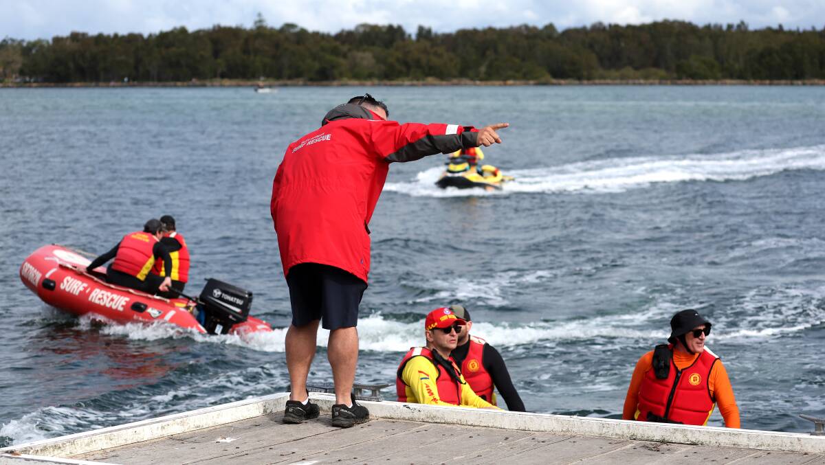 Surf Life Savers at the search on Sunday. Picture by Peter Lorimer
