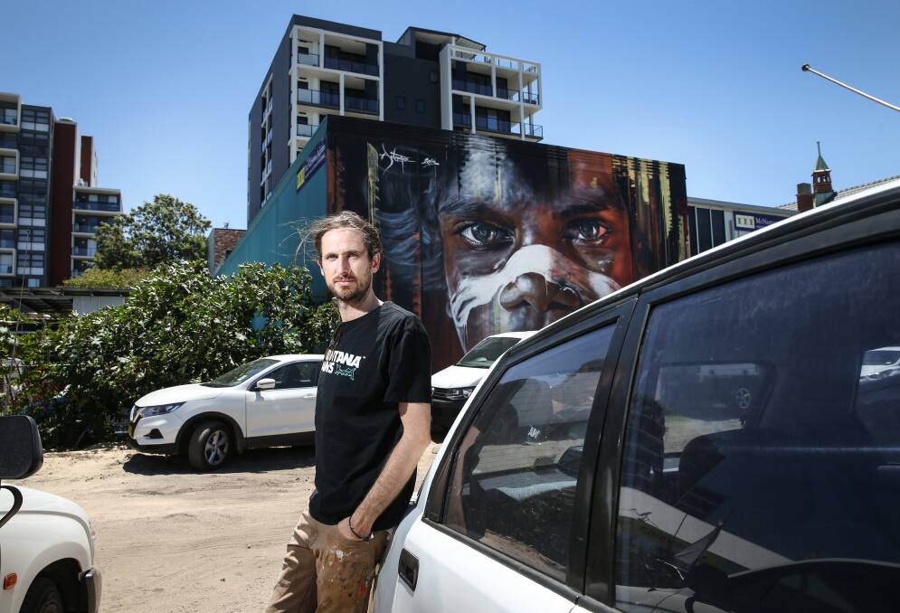 Iconic: Artist Matt Adnate said "there's a feeling in this one that I haven’t been able to match in a lot of paintings". He said he is "fine" with the demolition of the mural, because it will return "bigger and better". Picture: Marina Neil