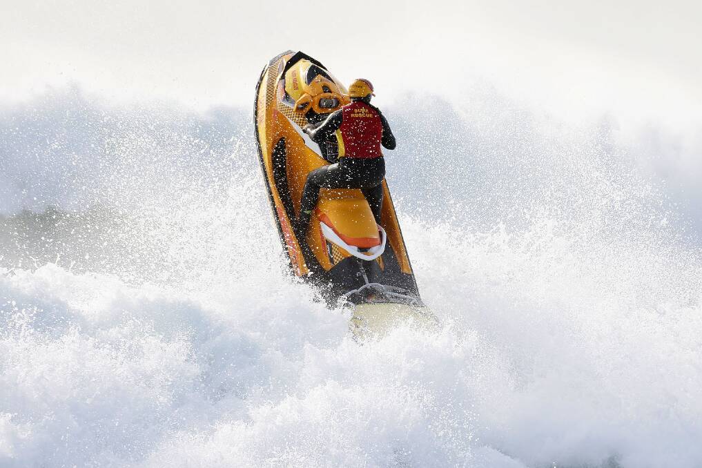 ROUGH: Stockton jet ski pilot Brendan Rymer tackling the swell. Picture: Daniel Danuser 