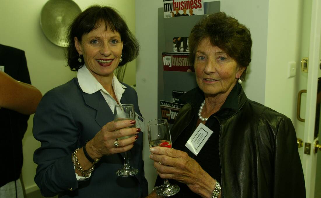 Newcastle real estate agent Kate Rundle, left, and the late Sonia Walkom, of Walkom Real Estate, in 2005.