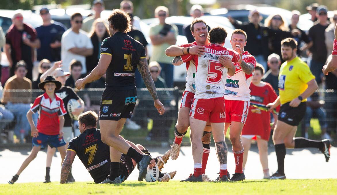 Souths celebrate a try against Cessnock on Saturday. Picture by Jonathan Carroll