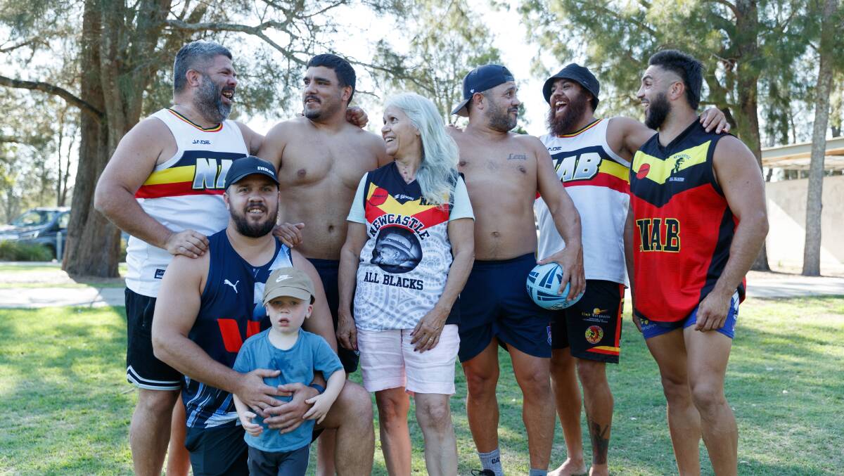 The Briggs family clan help form the Newcastle All Blacks at the Koori Knockout. Picture by Max Mason-Hubers
