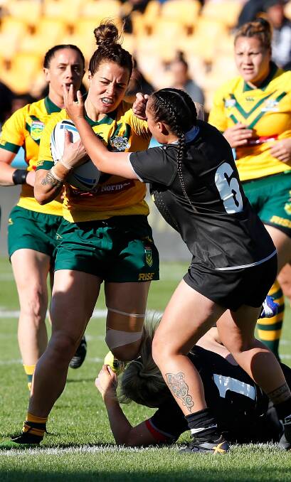 GAME BREAKER: CRL Newcastle representative Isabelle Kelly (left) scored twice for the Jillaroos in Saturday's Test win over the Kiwi Ferns in New Zealand, including the match-winner with five minutes remaining. Picture: AAP