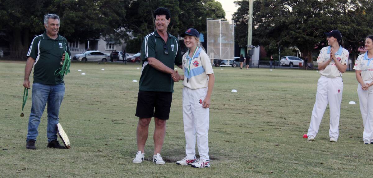 HONOURS: City's Sienna Eve was awarded player of the final by NDCA chairman Paul Marjoribanks at Learmonth Park in November. She was recently named in the Australian female under-15 squad. Picture: Josh Callinan