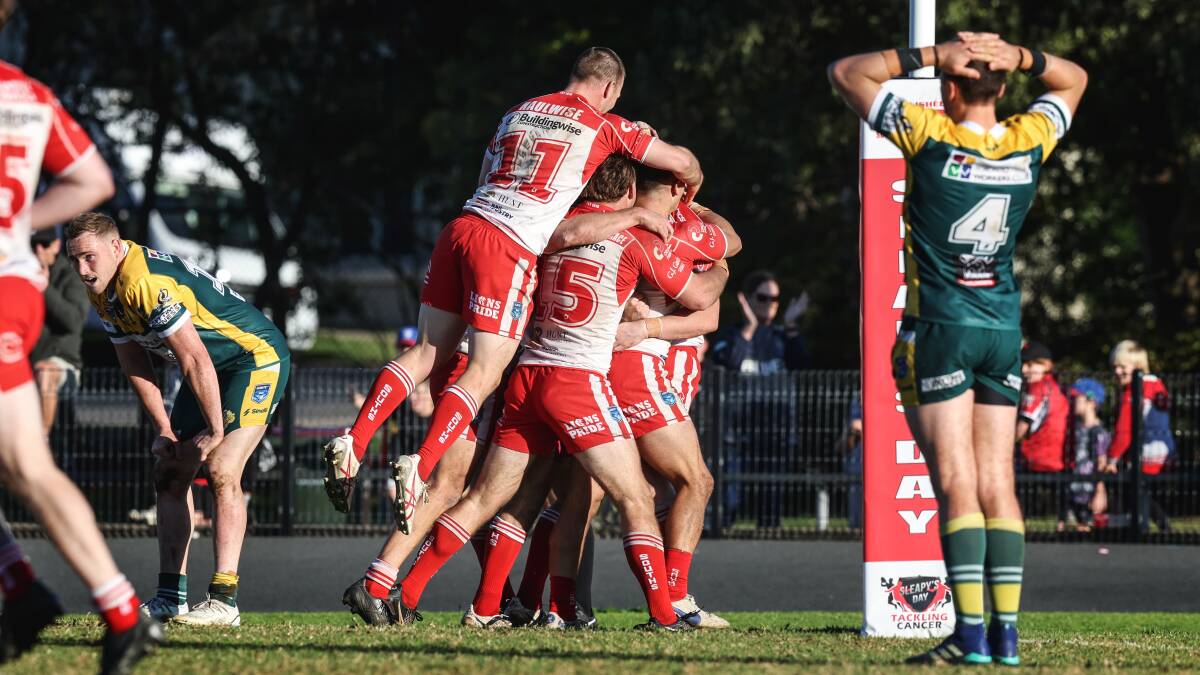 Souths celebrate a try during the Newcastle Rugby League season. Picture by Marina Neil